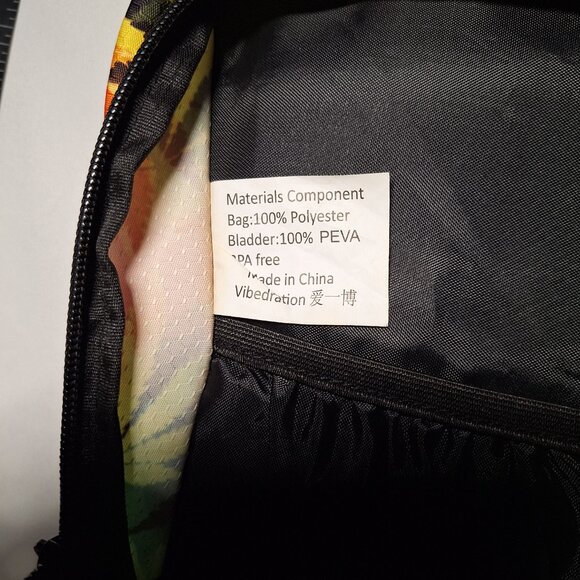 Vibedration Hydration Backpack w/o bladder - green, orange, black leaves… - Picture 6 of 16